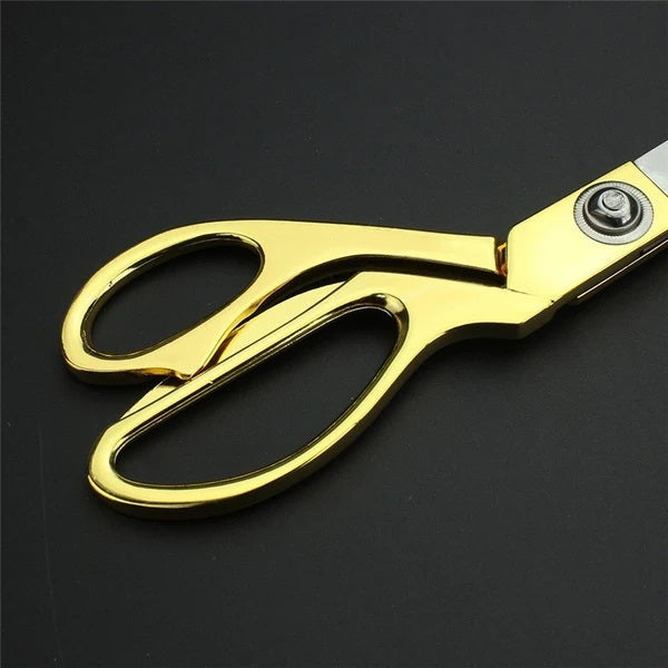 Golden stainless steel tailoring scissors for cloth cutting, professional quality Wukusy home improvement sewing tool.