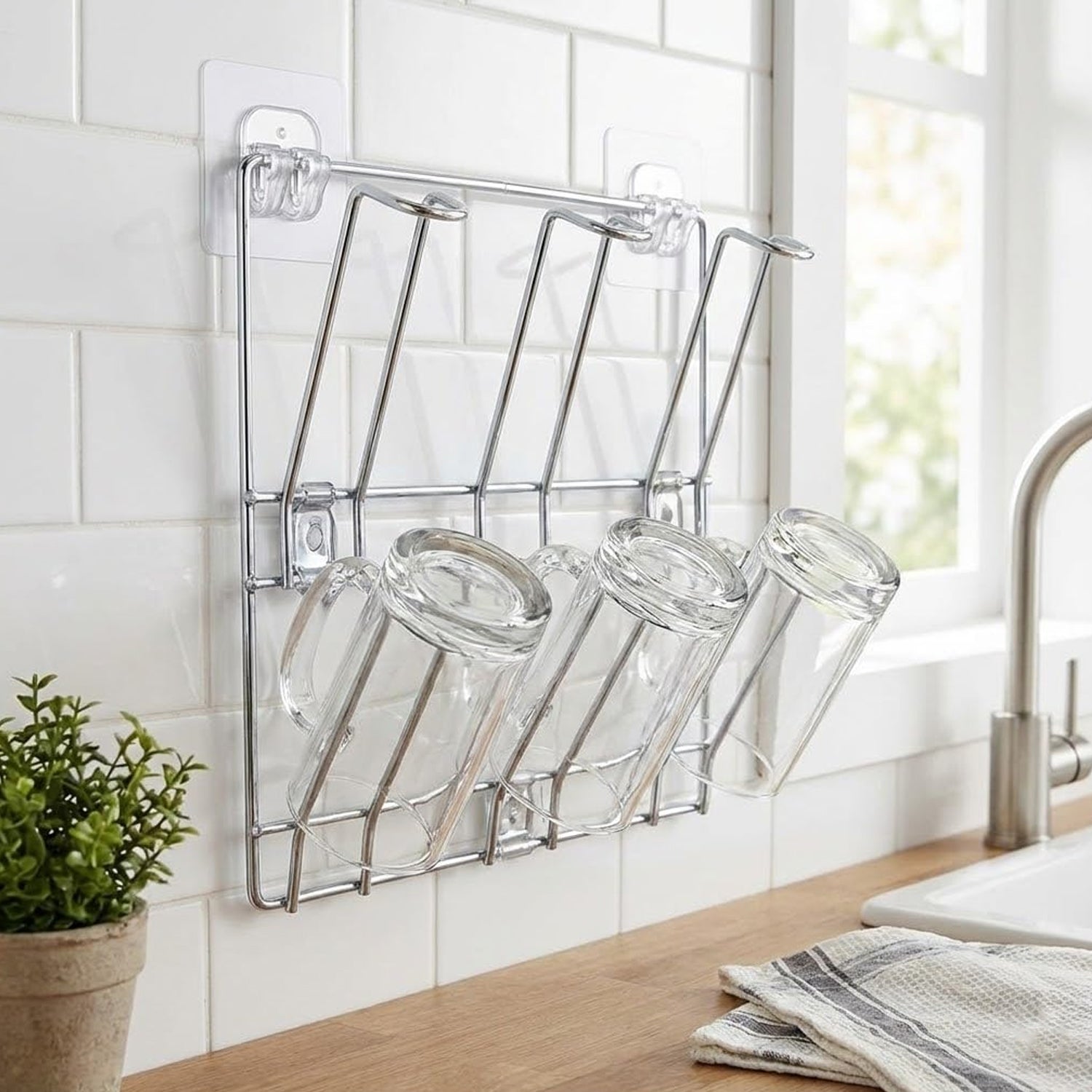 Wall-mounted stainless steel cup and mug holder rack by Wukusy, 25x25 cm, with space for multiple mugs or cups.