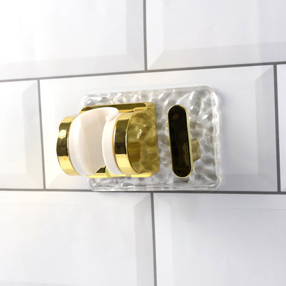 Wall mounted broom and mop holder by Wukusy with strong grip clips for secure storage of cleaning tools.