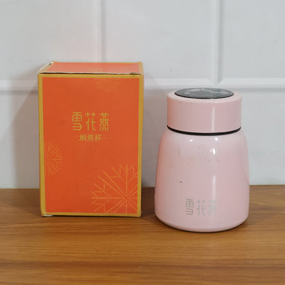 Wukusy premium stainless steel insulated temperature display bottle, 300ml, showing temperature reading on sleek silver bottle.