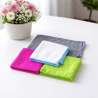 Set of four Wukusy microfiber cleaning cloths with soft, absorbent fabric for gentle surface cleaning and dust removal.