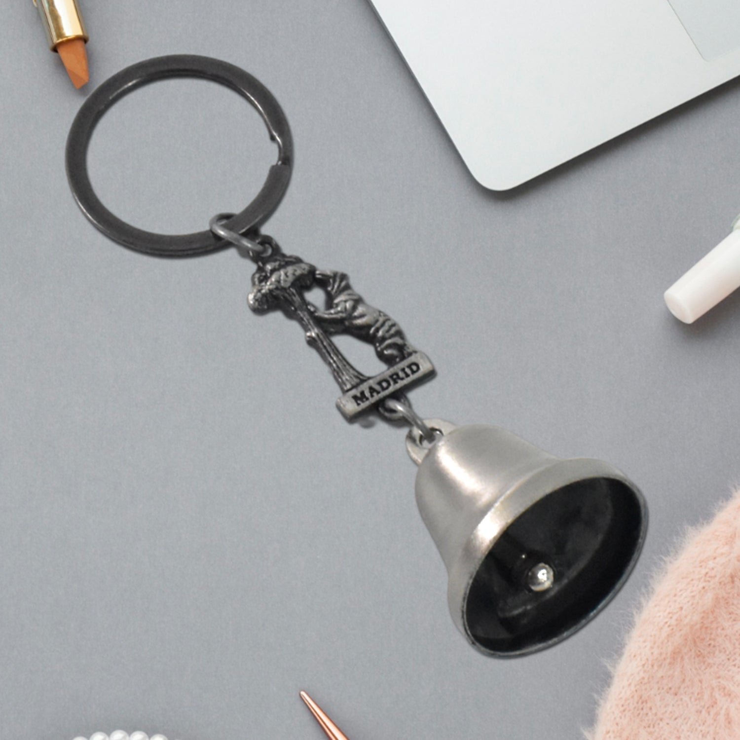 Metal small temple bell keychain with colorful finish, featuring a motorcycle bell design, perfect for keychains or home decor.