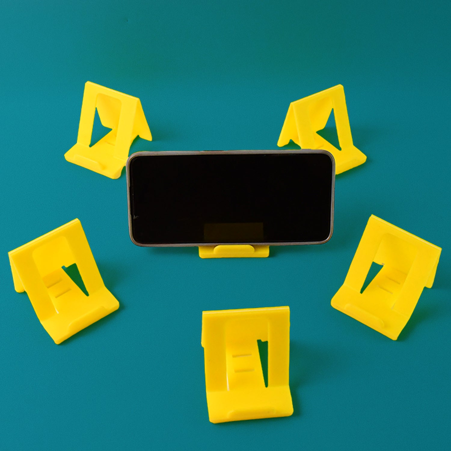 Six Wukusy adjustable foldable plastic mobile phone stands in mixed colors, showing versatile support for smartphones.