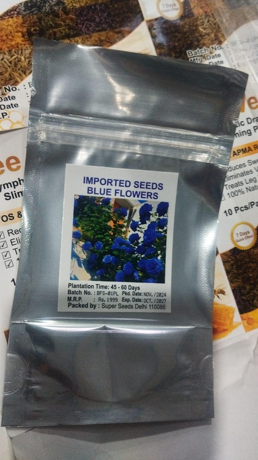 Blue climbing rose seeds from 205, shown in a clear container with vibrant blue seeds ready for planting.