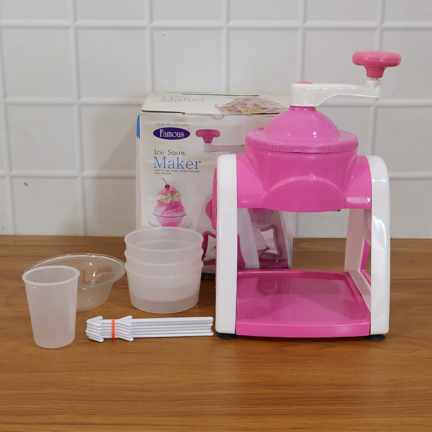 Pink Wukusy manual Gola maker tool for crafting leather or fabric straps with easy-to-use design.