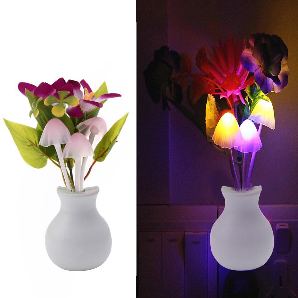 Wukusy 217 LED mushroom night light with multicolor glow, sensor auto on/off, decorative flower-shaped lamp for bedroom or nursery.