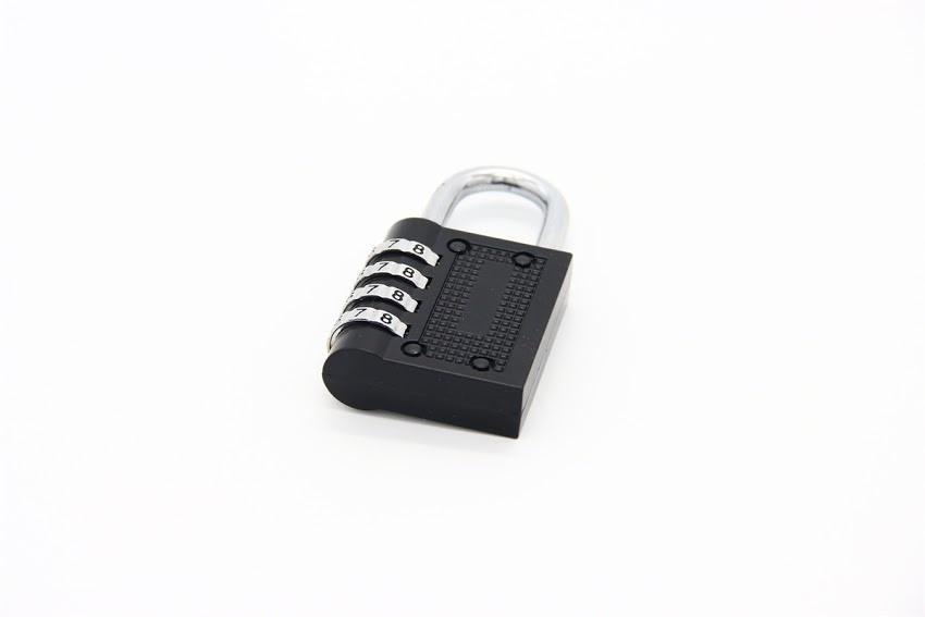 Wukusy 218 4-digit combination padlock with silver body and black dial, secured on a metal latch.