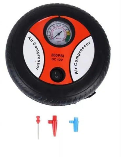 Automatic car air compressor from 22123, part of a car tyre puncture repair kit, with hoses and digital display for inflation.