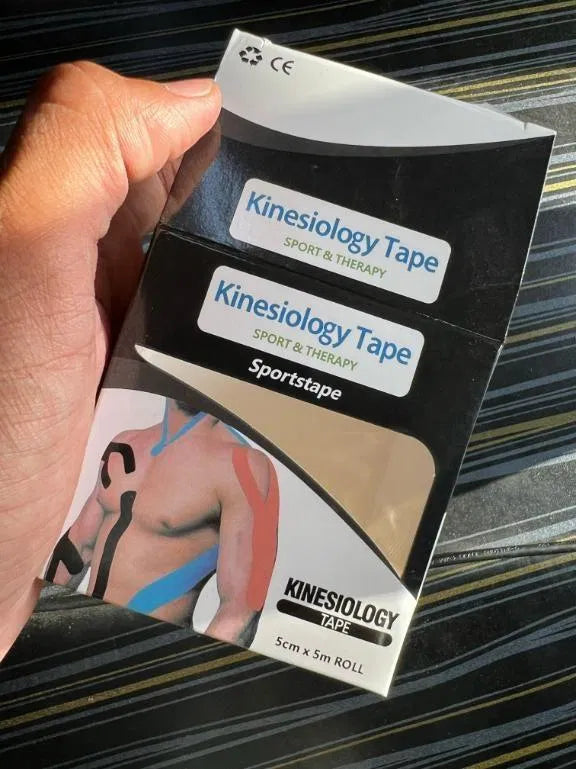 Kinesiology Tape Adhesive joint wraps for muscle pain relief, 22123 brand, shown in a close-up of the tape applied to skin.