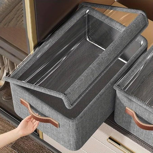 Large clear fabric folding storage boxes with lids, stackable closet organizers and label tags for home makeup vanity storage.