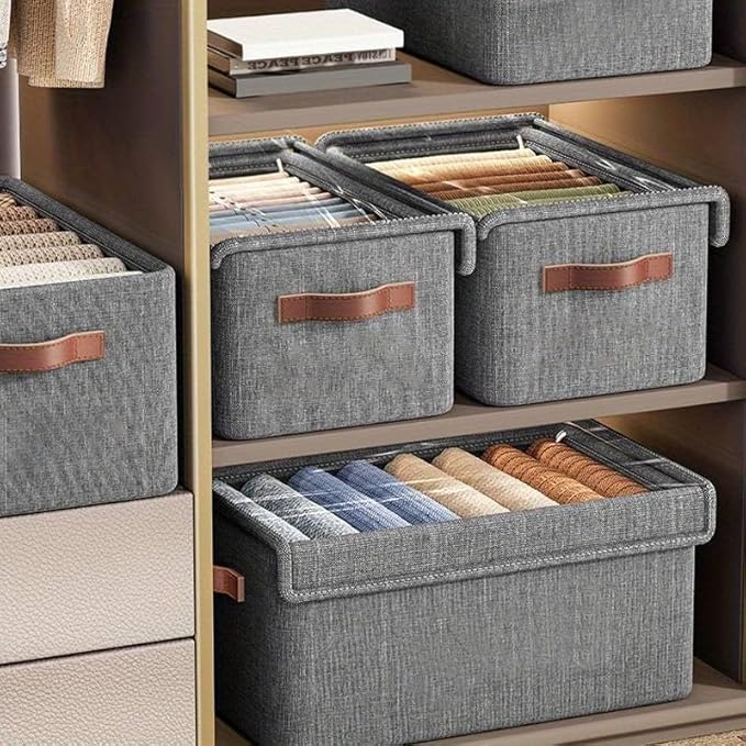 Large clear folding storage boxes with lids, fabric linen closet organizers, stackable makeup vanity boxes with labels.