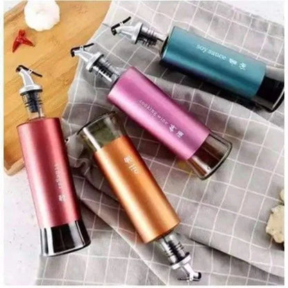 Automatic opening and closing oil dispenser bottle by 22927, designed for precise pouring of cooking oils.