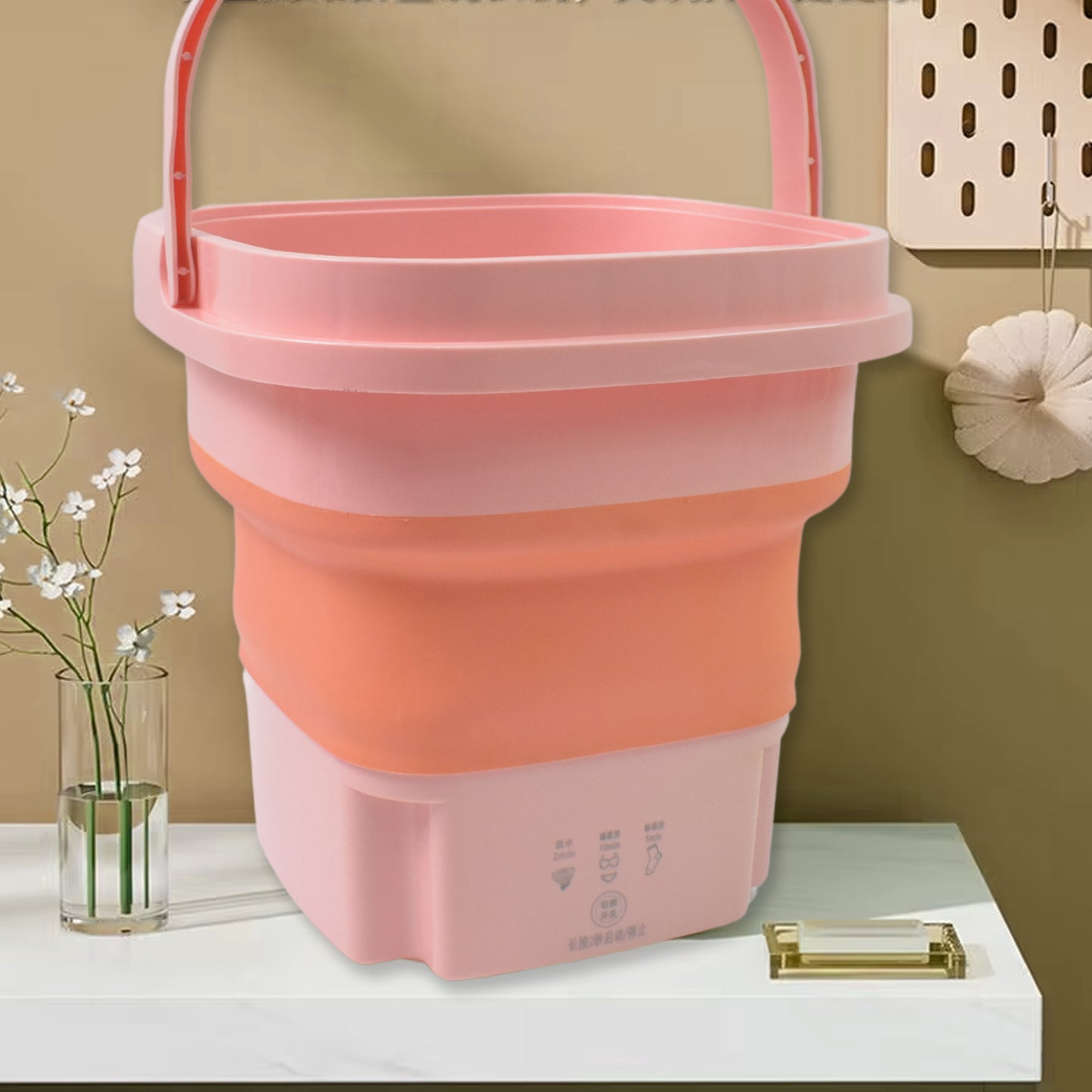 Foldable Wukusy portable washing machine and dryer combo in mixed colors, compact for home laundry solutions.