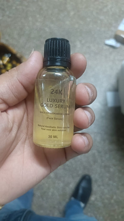 Drpshippr 24K Gold Face Serum bottle with gold accents, showcasing a luxurious beauty and personal care skincare product.