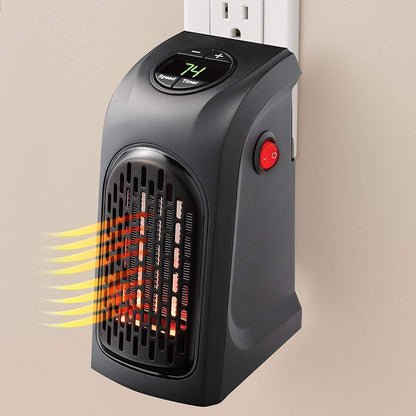 Wukusy 251 Electric Mini Handy Heater plugged into wall socket, compact 400W portable space heater for quick warmth.