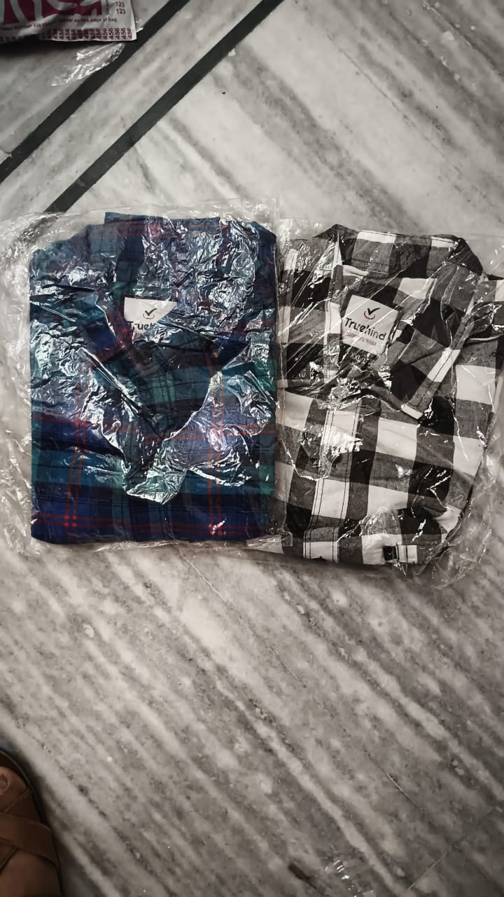 Pack of 2 men's multicolor shirts from 2527, featuring casual button-up styles with vibrant patterns.