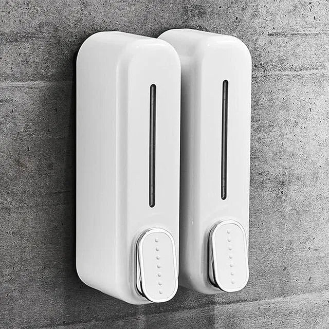 White wall-mount hand liquid shampoo and shower gel dispenser for hotel bathrooms, made by 25509, with a sleek soap holder design.