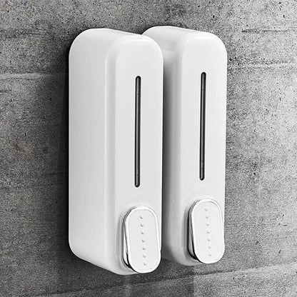 White wall-mount hand liquid shampoo and shower gel dispenser for hotel bathrooms, made by 25509, with a sleek soap holder design.