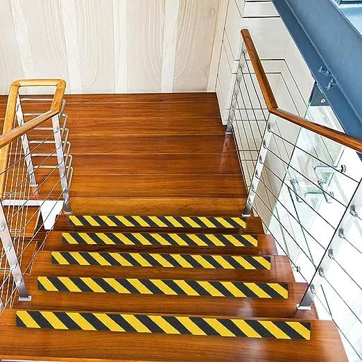 Yellow and black anti-slip adhesive tape from 25544, 5cm by 5m, designed to provide safety and grip on surfaces.