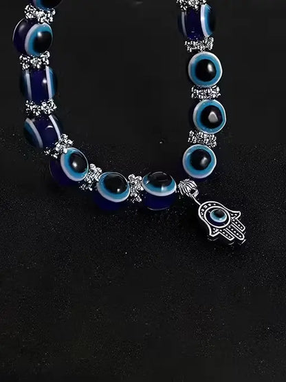 Ekom evil eye adjustable bracelet for women featuring blue and white beads, believed to ward off negative energy.