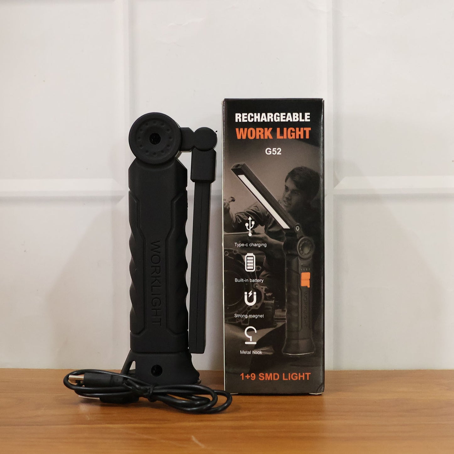 Wukusy rechargeable adjustable LED work light with large bright beam, portable and versatile for outdoor and workshop use.