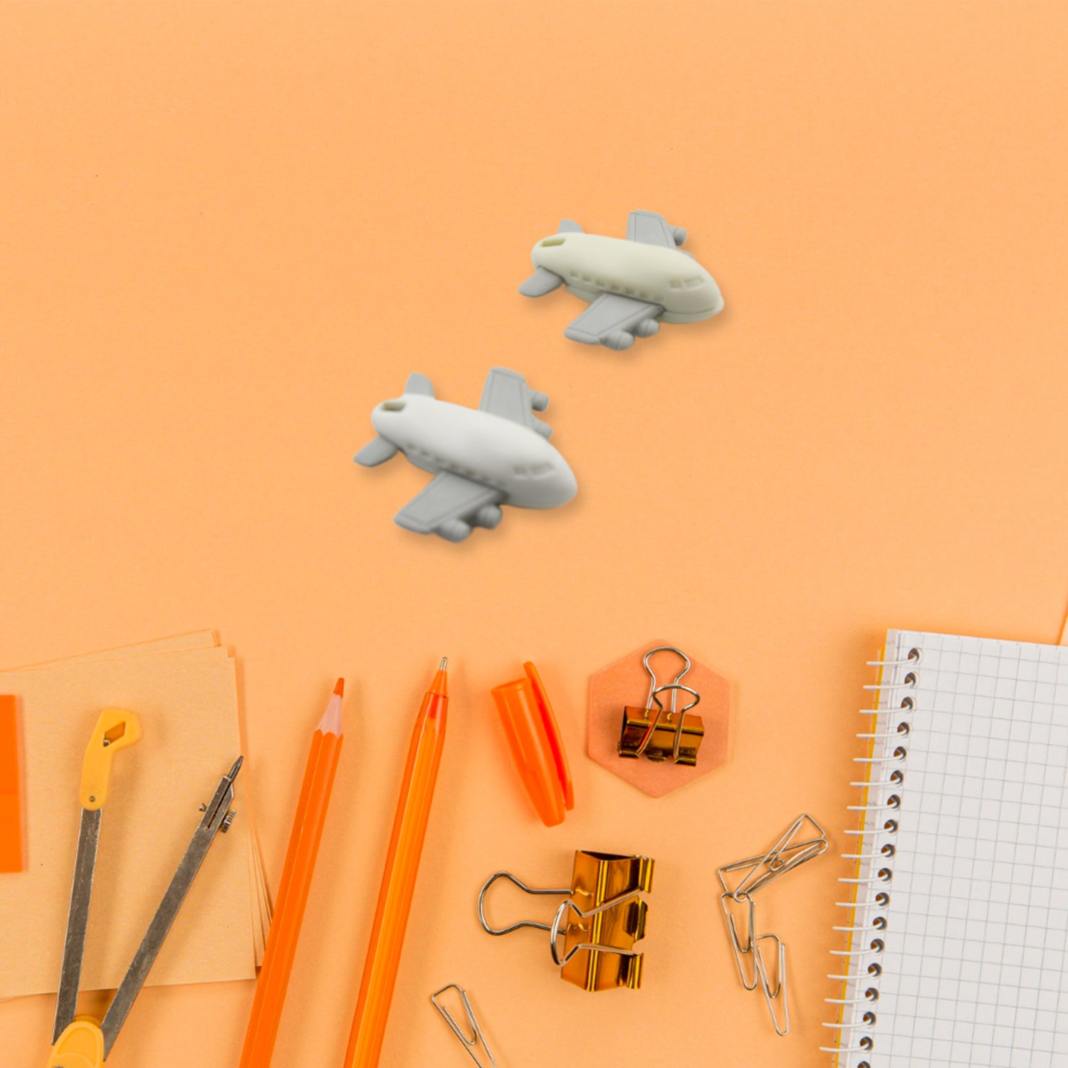 Set of four Wukusy vehicle pattern erasers for school stationery, featuring colorful vehicle designs on each eraser.
