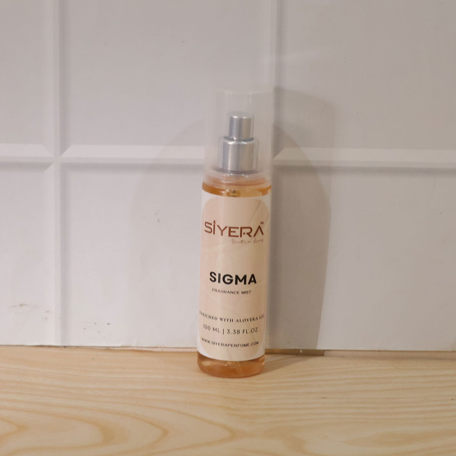 Wukusy Sigma Fragrance Mist Body Spray with aloe vera gel in 100ml bottle, featuring a sleek design and floral scent.