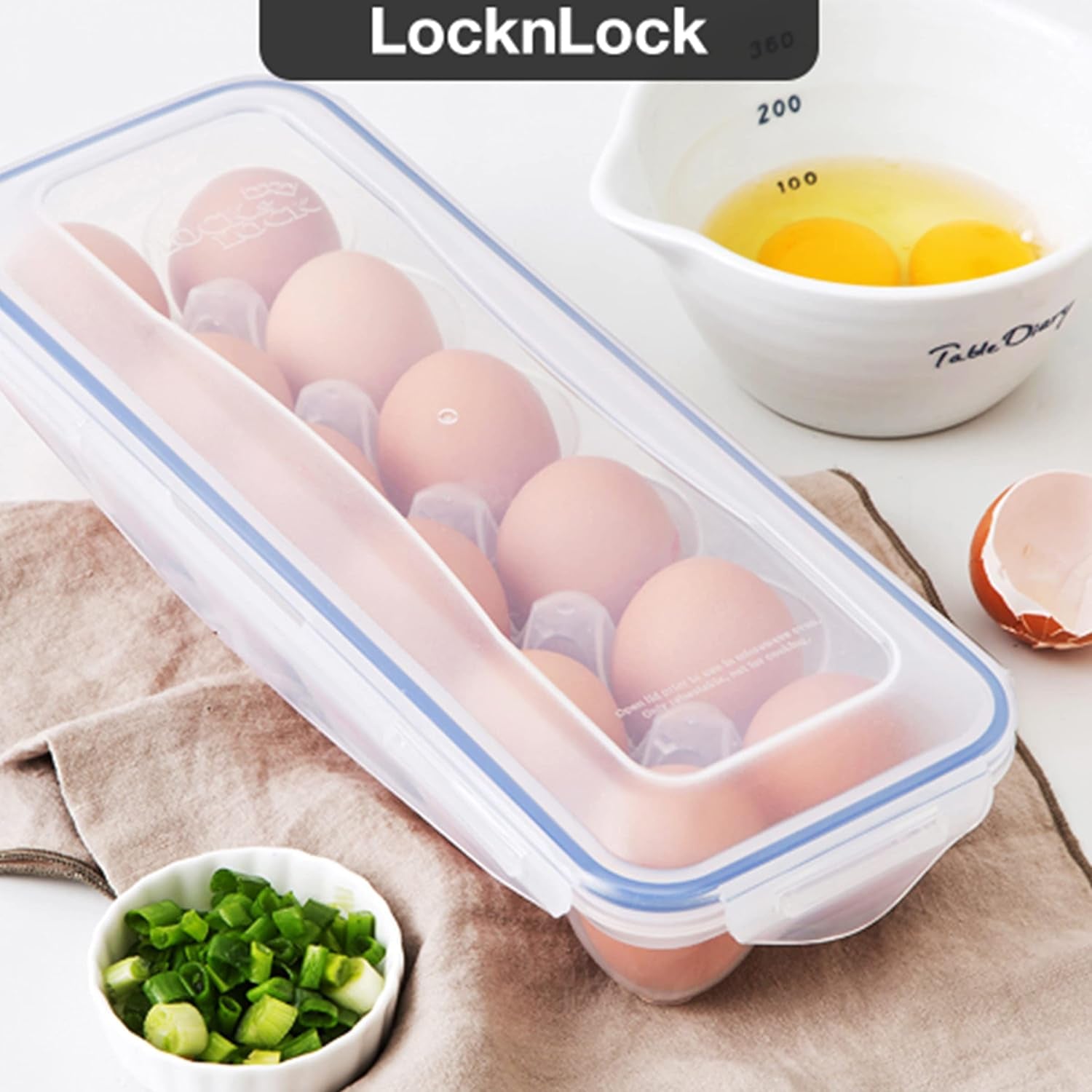 Wukusy egg storage tray holding a dozen eggs, made of durable plastic for kitchen organization and freshness.