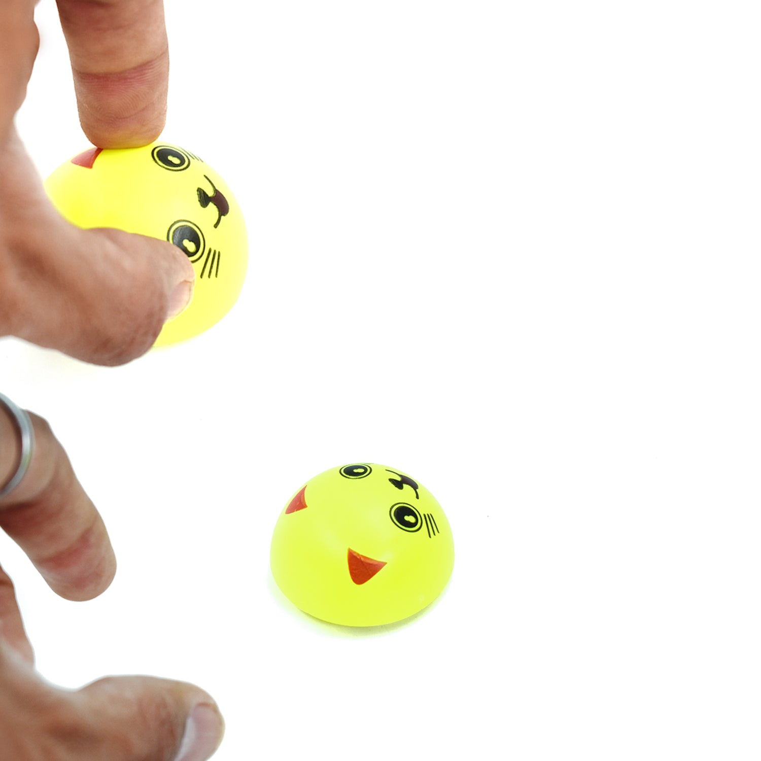Wukusy 4417 pull back smiley toy with bright yellow face and cheerful expression, designed for fun and play.