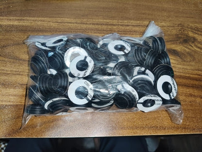 Set of 100 Wukusy car door shock absorber stickers for door protection, shown on vehicle door in close-up image.