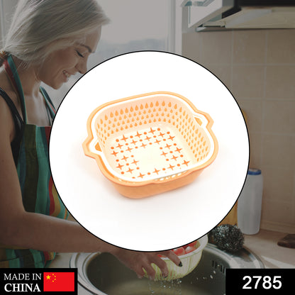 Wukusy 2-in-1 basket strainer for rinsing fruits, vegetables, and other items, with a mesh design for easy cleaning and drainage.