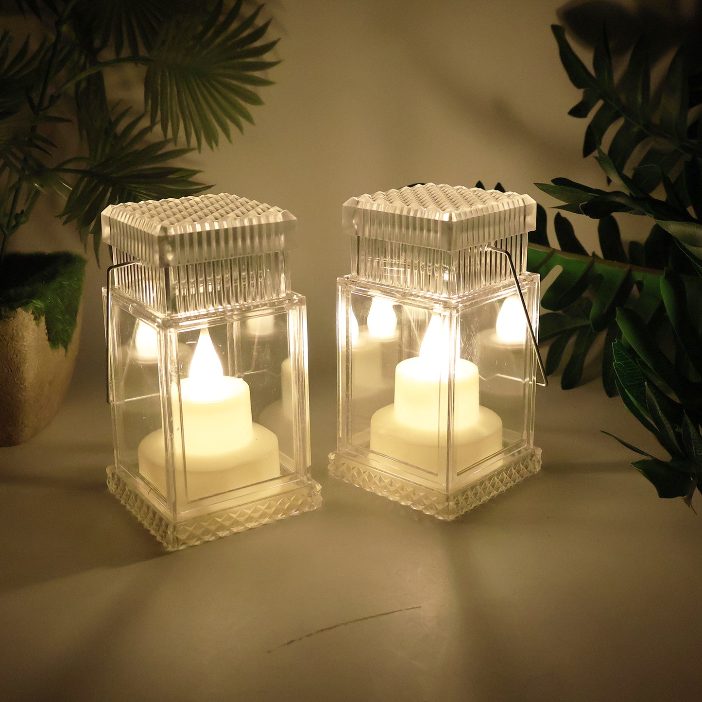 Set of four Wukusy LED flameless lantern-style decorative candles for home decor, featuring warm ambient lighting and intricate design details.