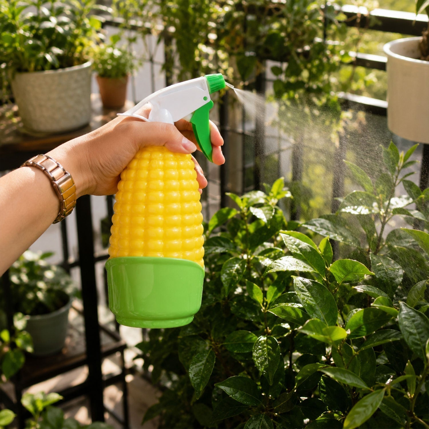 Wukusy corn-shaped trigger spray bottle for plants and cleaning, showing the water sprayer with a yellow corn design and nozzle