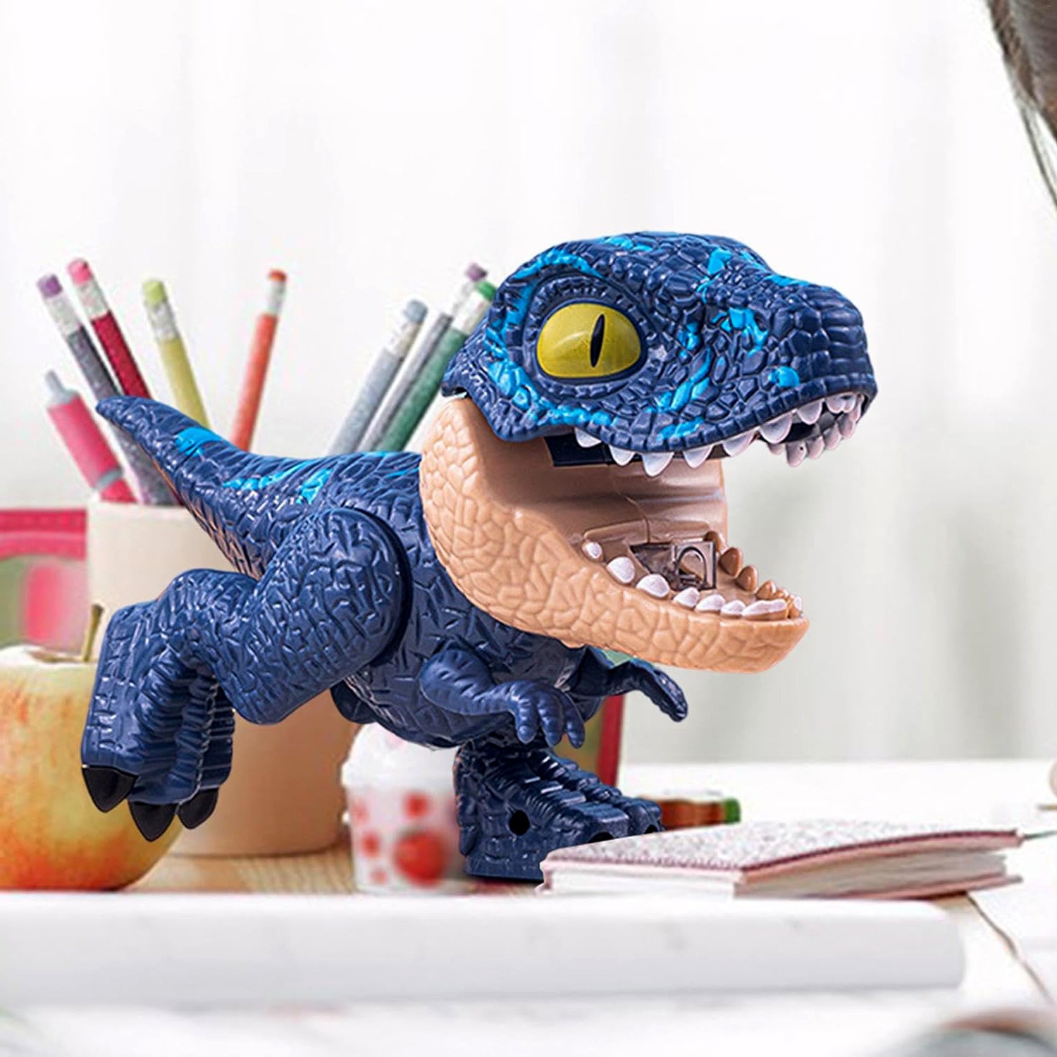 Colorful dinosaur-shaped stationery gift set for kids, includes pencils, erasers, and notepads, by Wukusy.