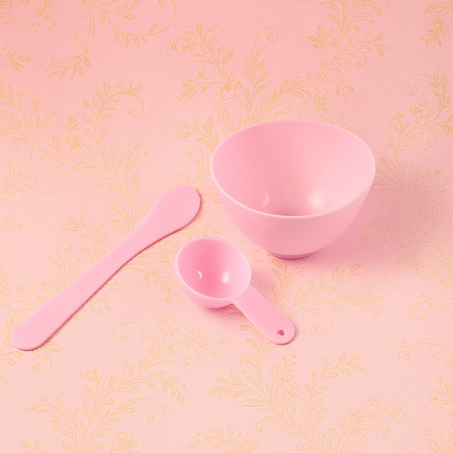 Two white facial mask mixing bowls with wooden spatulas in a 3-piece Wukusy set, placed on a neutral surface.