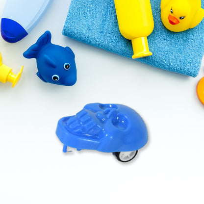 Small Wukusy pull back skull toy for kids, featuring a detailed skull design and fun pull-back action.