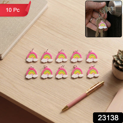Set of 10 colorful rainbow cloud bag charm keychains by Wukusy, featuring cute cloud and rainbow designs for accessories.