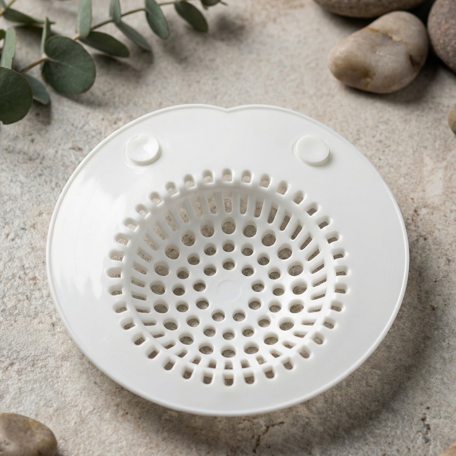 Flexible silicone sink drain strainer from Wukusy, showing a close-up of the bright red, flexible, mesh filter with a sleek design.