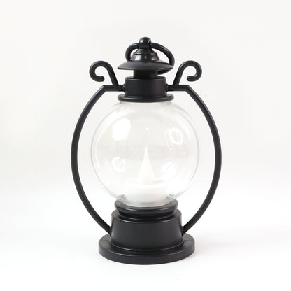 Wukusy LED Storm Lantern decorative light, black metal with glass panels, designed for outdoor or indoor ambiance lighting.