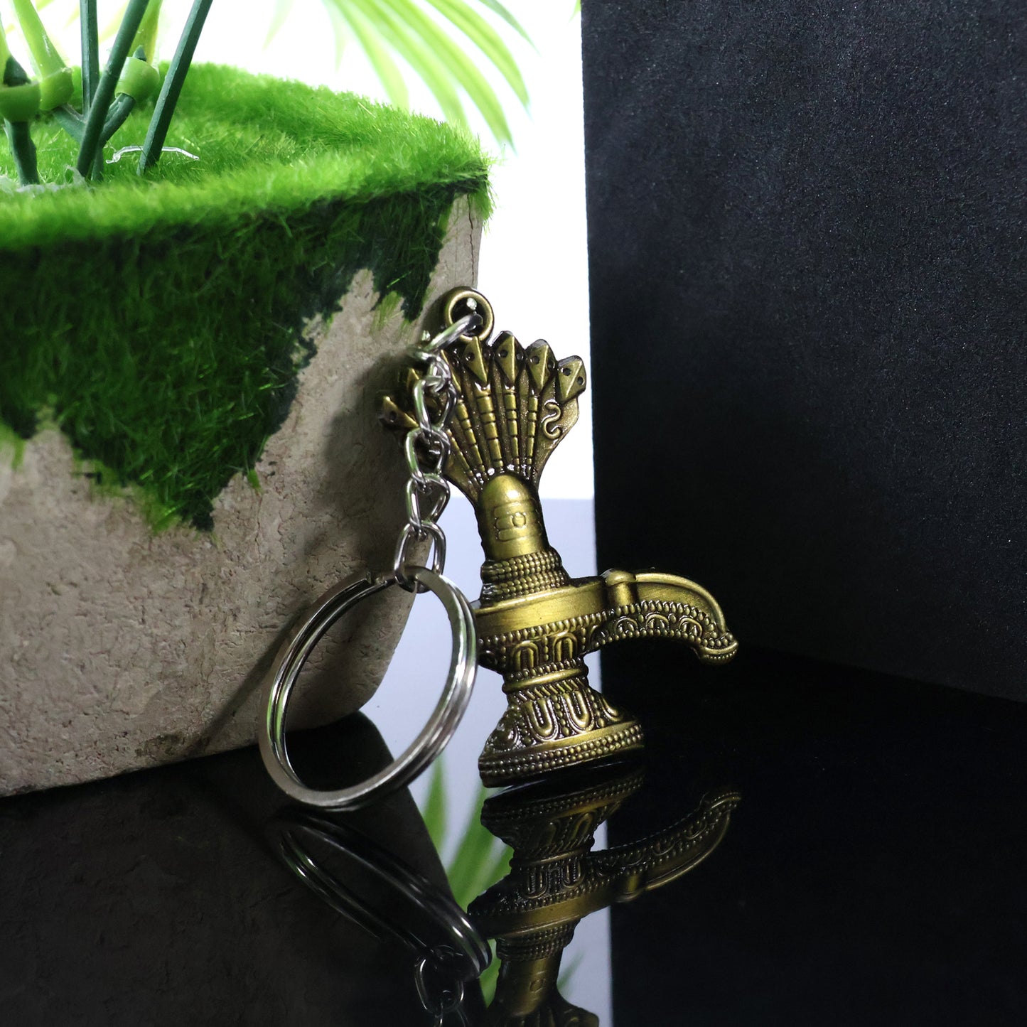 Antique Lord Shiva Shivaling metal keychain with intricate design, featuring a detailed Lord Shiva figure, by Wukusy.