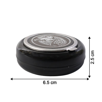 Wukusy round smokeless ashtray with lid for home use, made of durable material, designed to contain smoke and cigarette ash.