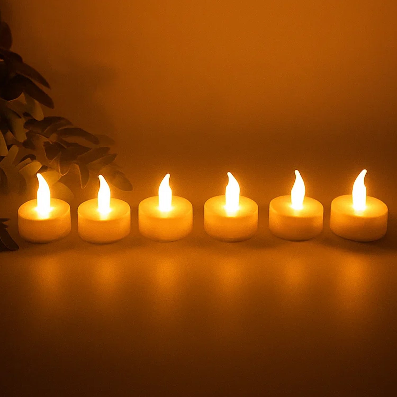 Six Wukusy flameless LED candles with remote control, creating warm ambient home decor lighting in a modern style.