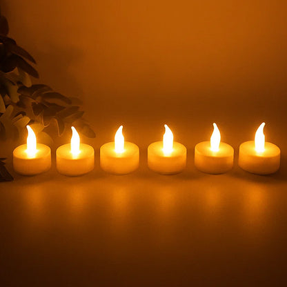 Six Wukusy flameless LED candles with remote control, creating warm ambient home decor lighting in a modern style.