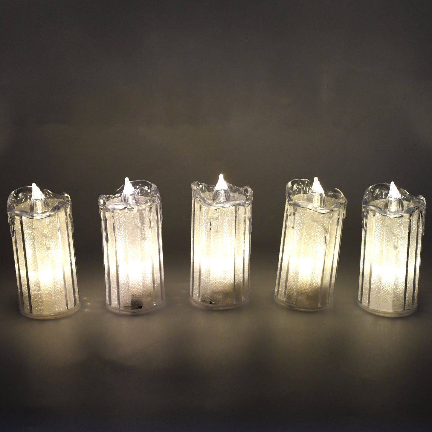 Wukusy 24-piece flameless LED tea light candles with flickering, smokeless electronic design for home decor ambiance.