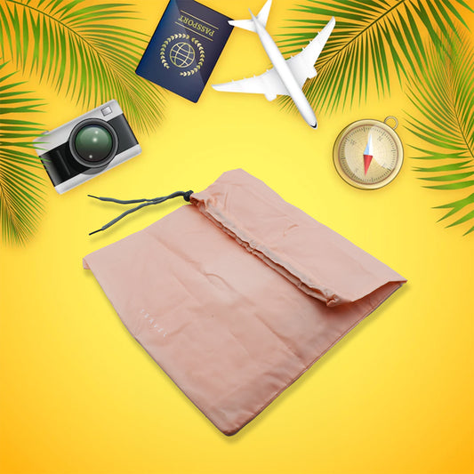 Set of four Wukusy waterproof nylon travel storage bags with drawstrings, used for organizing clothes and shoes in luggage.