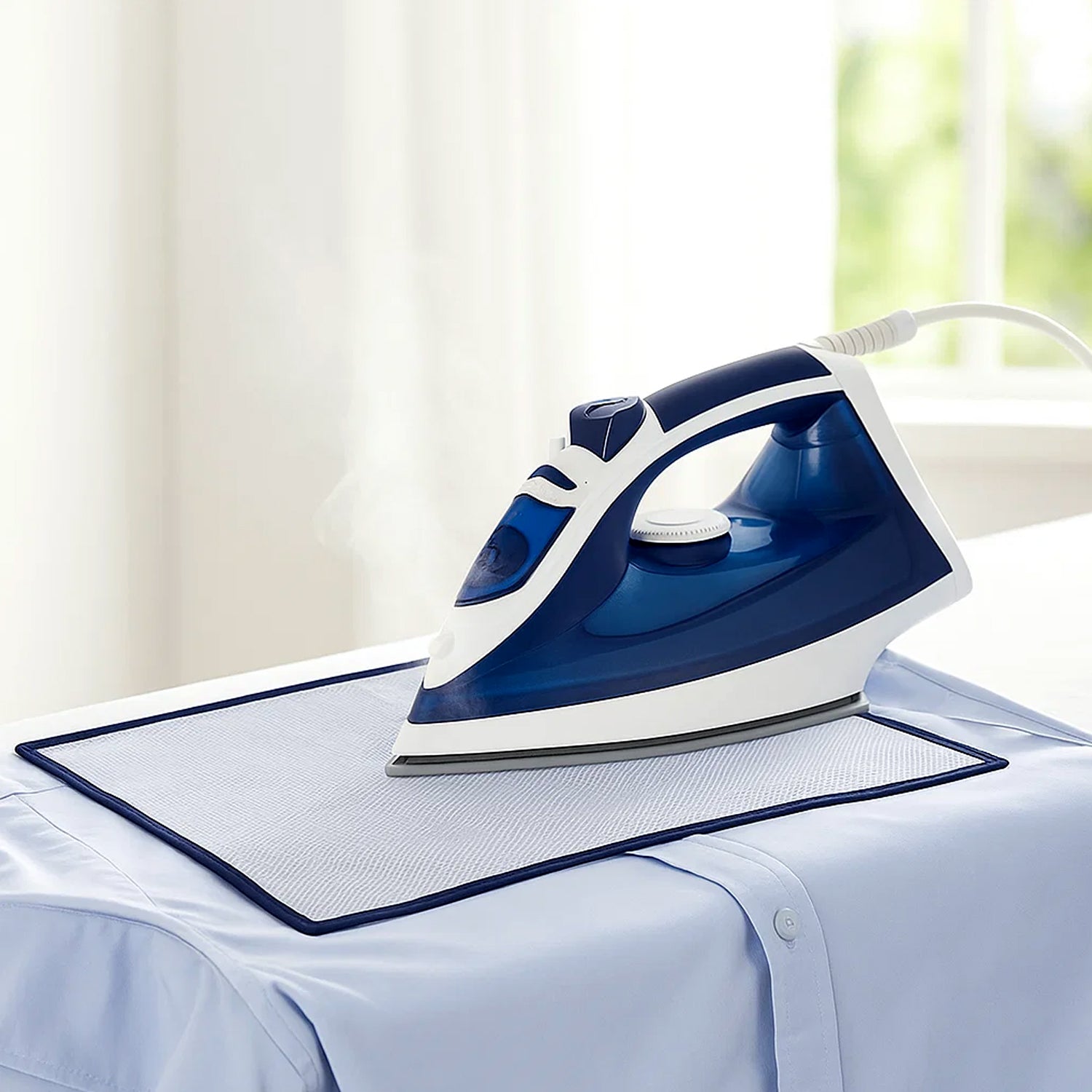 Wukusy heat-resistant ironing mesh press cloth, 65x40 cm, protecting fabrics during ironing in the image.