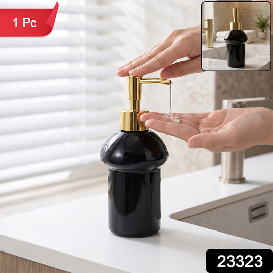 Black glass liquid soap dispenser bottle with gold pump from Wukusy, refillable, elegant bathroom or kitchen accessory.