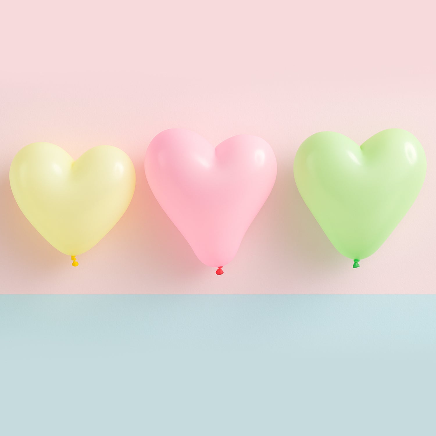 Pink heart-shaped balloon toy by Wukusy, featuring a shiny surface and playful design, perfect for celebrations or decorations.