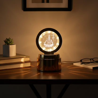 Wukusy Mahadev 3D crystal ball night light glowing with intricate Mahadev design, illuminated in a dark setting.