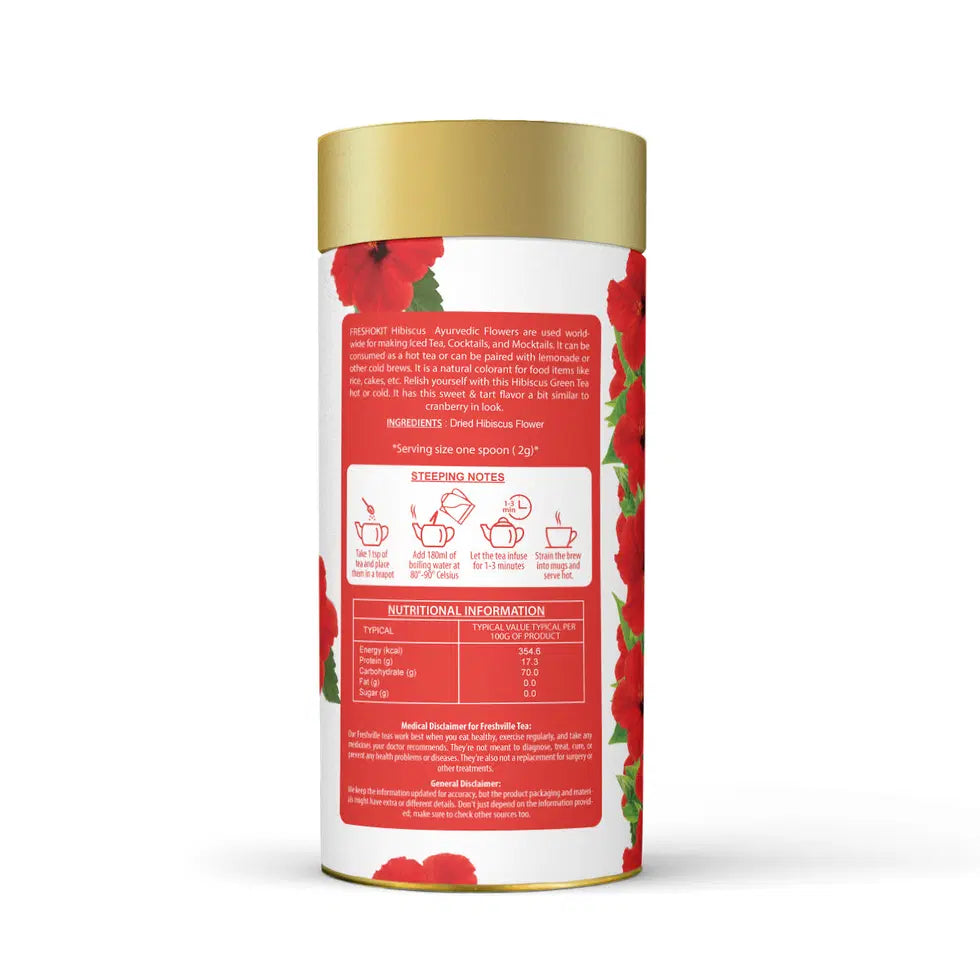 Freshville Hibiscus Tea in a clear glass tea pot, showcasing vibrant red hibiscus flowers and brewed tea inside.